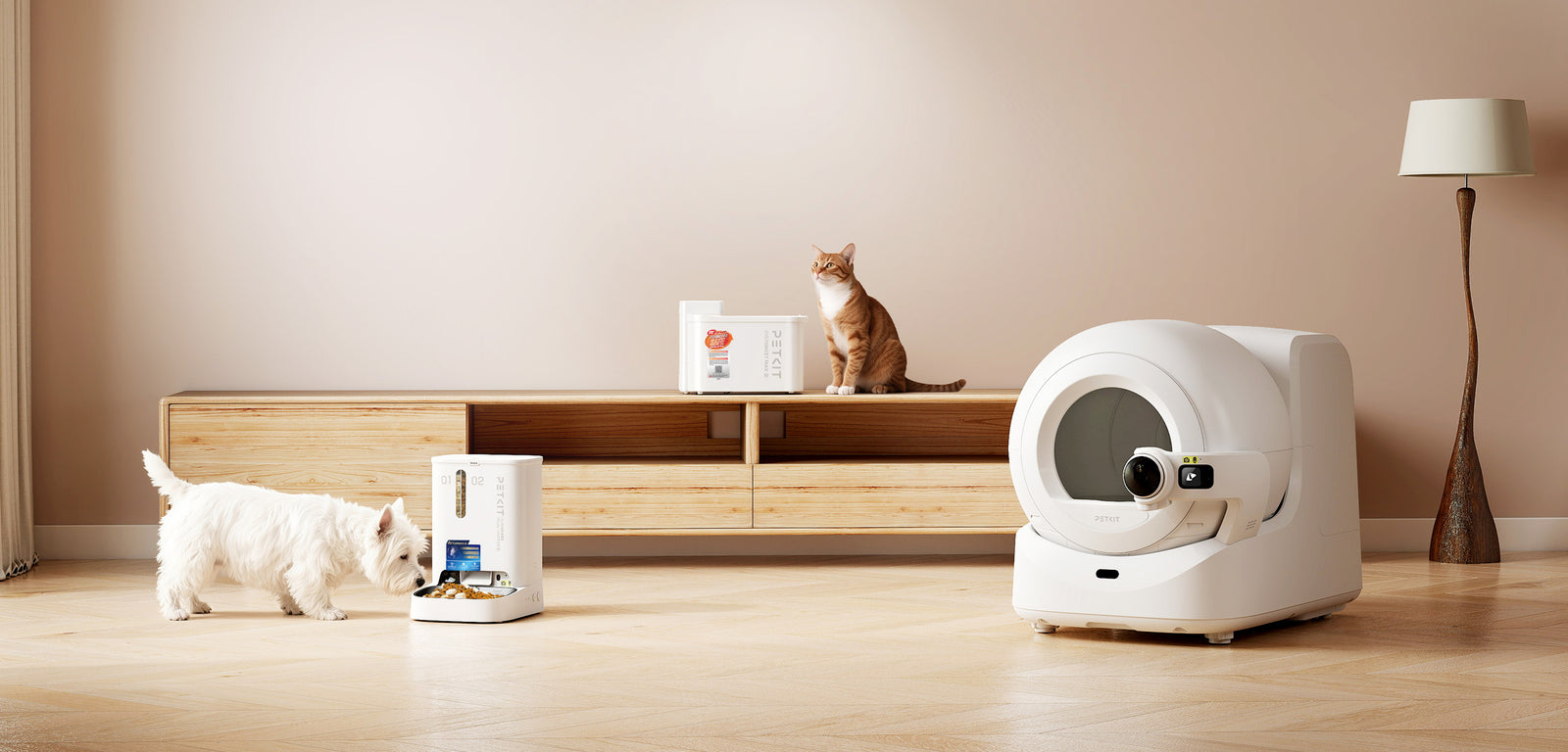 PETKIT feeding, drinking and litter-care devices in a home with a dog and a cat.